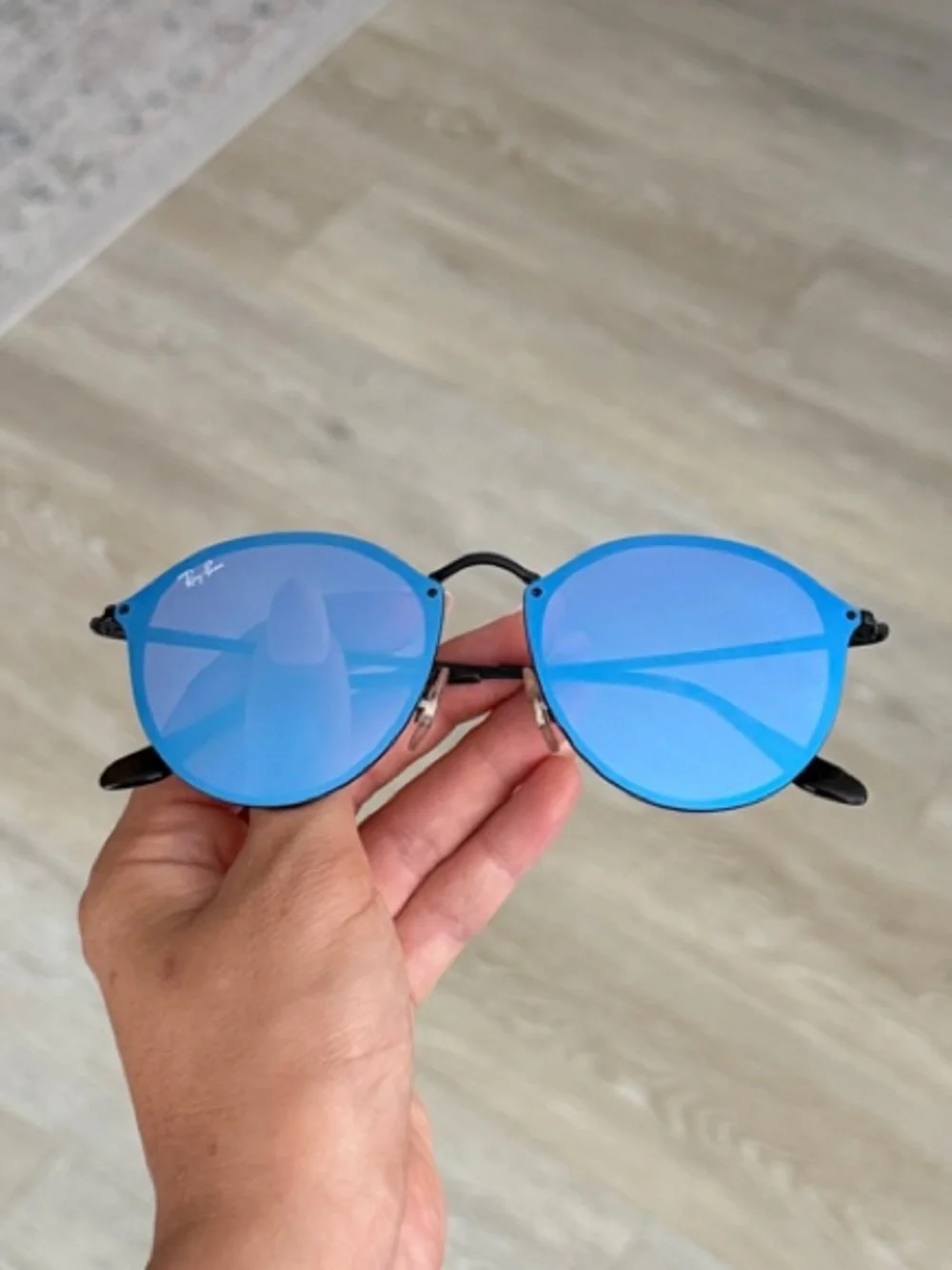 Ray-Ban Black Frame Sunglasses with Blue Lenses and Brown Case